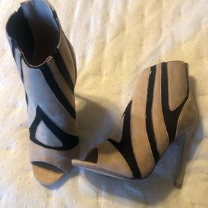 Tan and black heels
